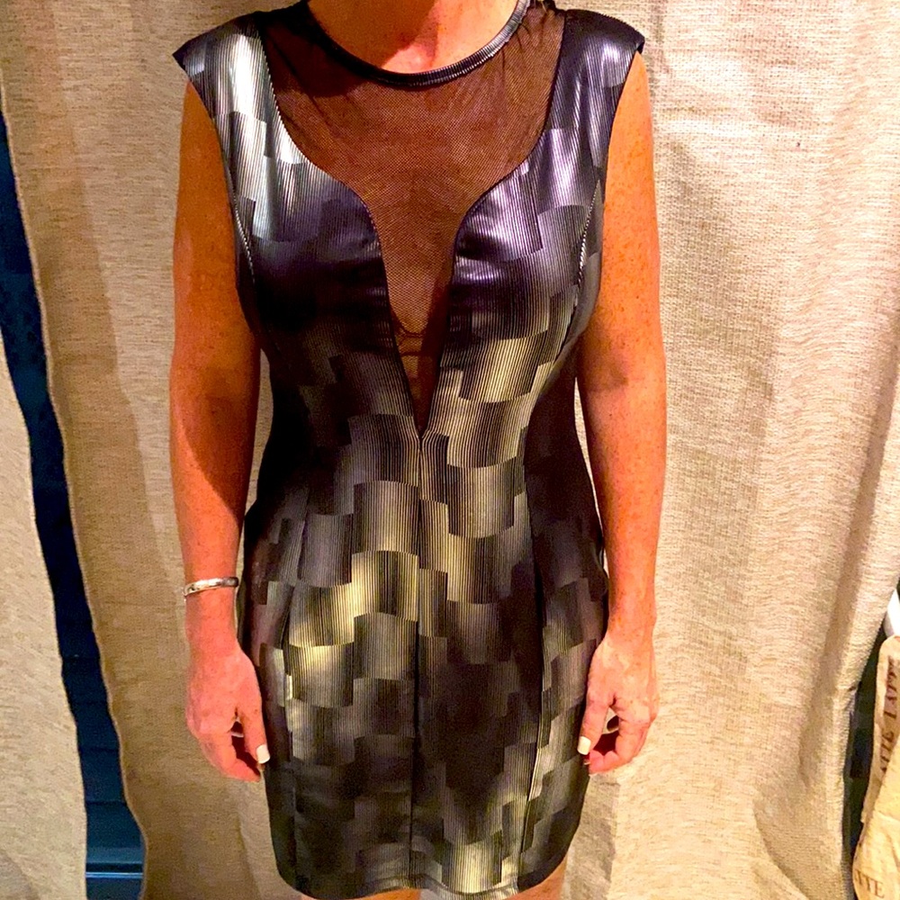 This is a sexy cocktail dress by Nikki Becky